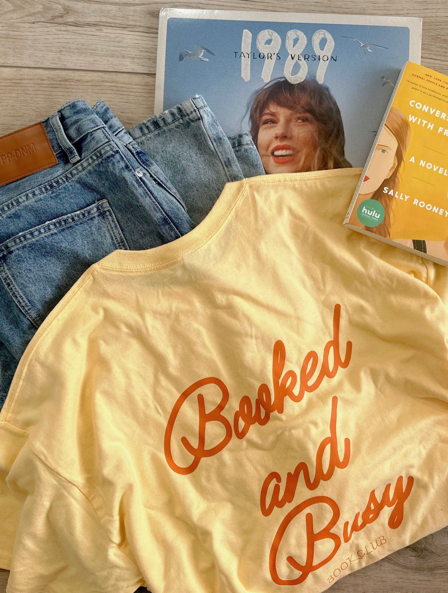 Booked and Busy Club - Butter Yellow Unisex Raw Hem Tee